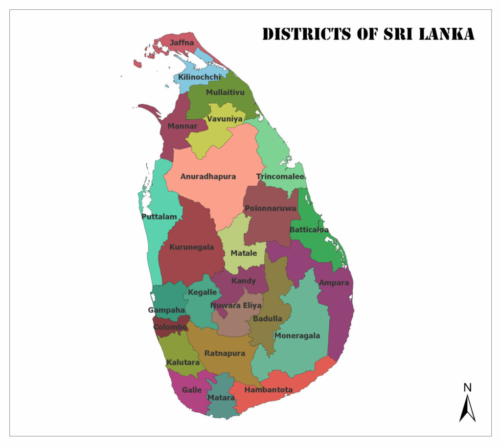 A color-coded, oval-shaped map of Sri Lanka's districts, labeled in English, with a compass arrow in the bottom right.