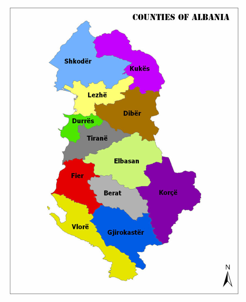 A vibrant map of Albania's counties, each uniquely colored and named, with a compass rose in the bottom right.