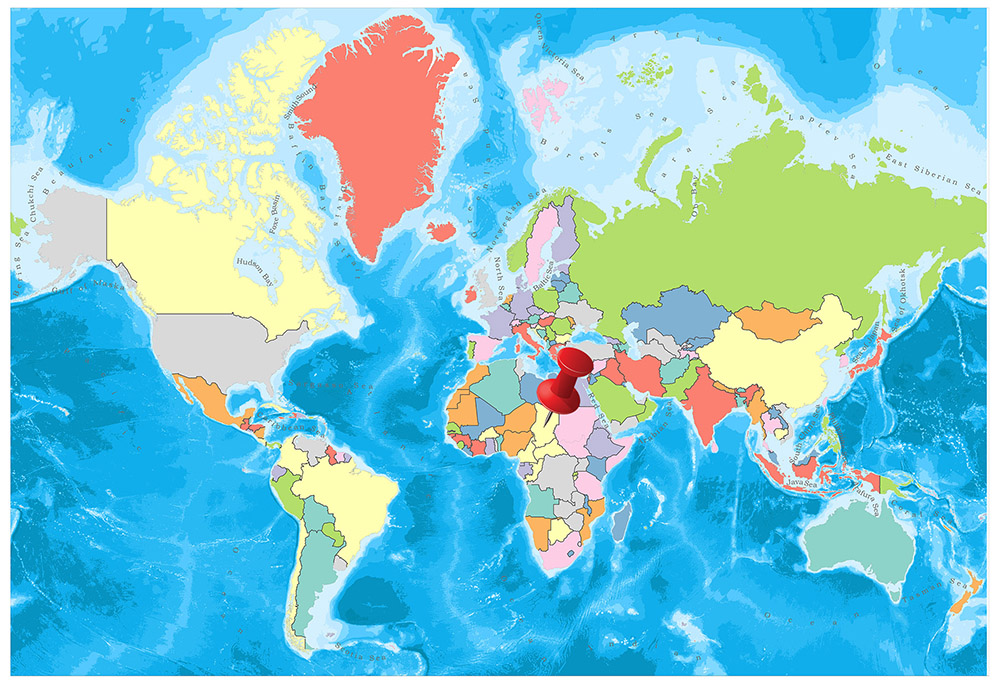 A colorful world map with countries in various colors against a blue ocean background, with a red circle marking a specific location.