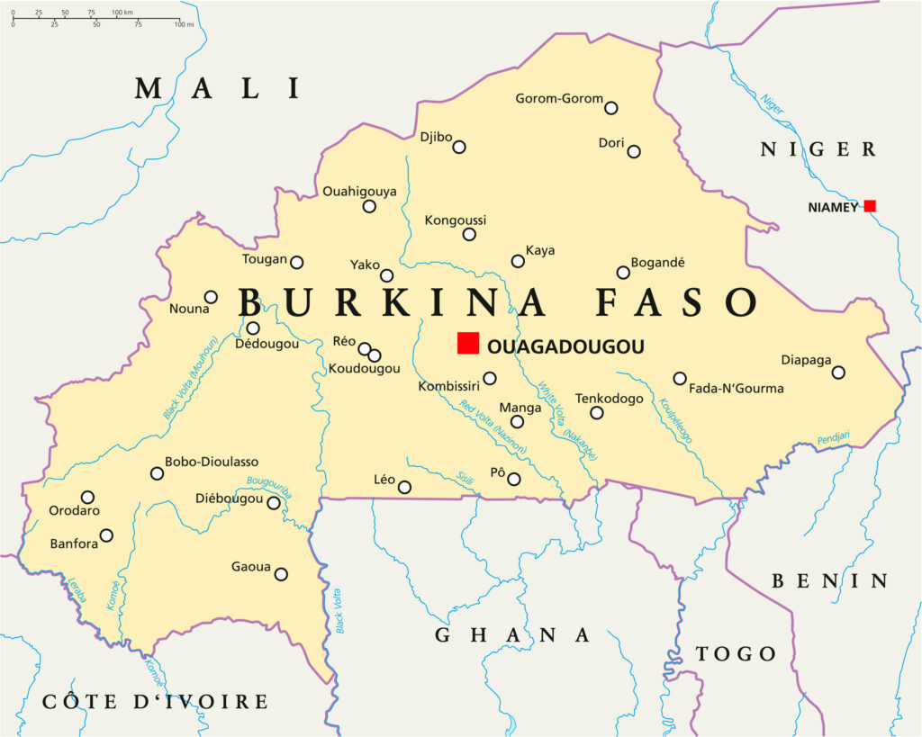 A political map of Burkina Faso showing its capital Ouagadougou, major cities, borders with neighboring countries, and color-coded regions.