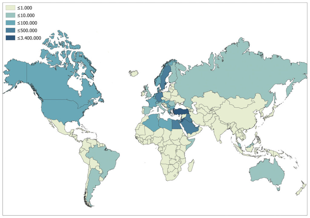 A color-coded world map shows countries' income/GDP levels in shades of blue, with darker blues indicating higher incomes.