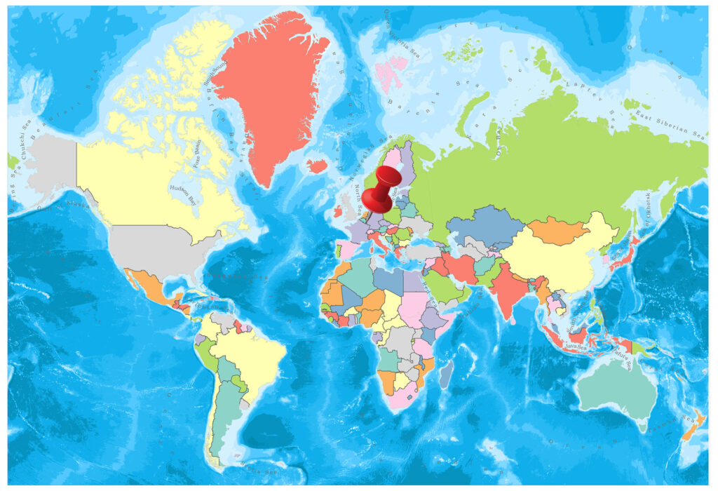 A colorful world map with countries marked in different colors against a blue ocean background.