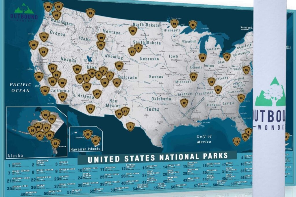 A scratch-off map of the United States with marked locations for national parks, including an inset list of the parks by name.