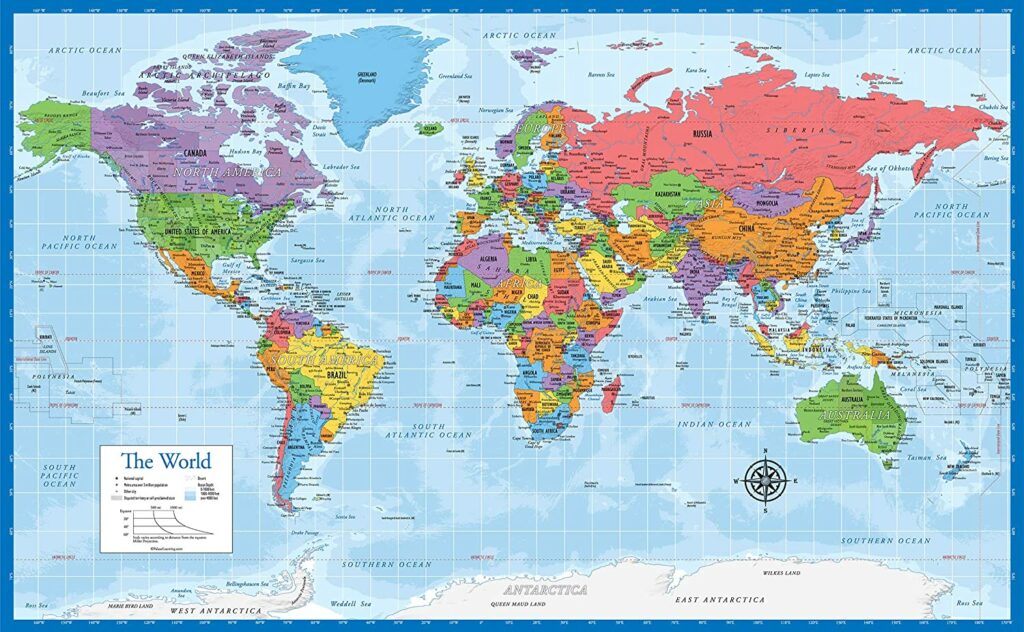 A laminated world map poster featuring colored countries, light blue oceans, longitude/latitude lines, country names, major cities, and geographical features.