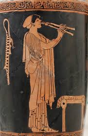 A black-figure pottery image depicting an ancient Greek figure playing a double flute, with a lyre and a stool in the background.