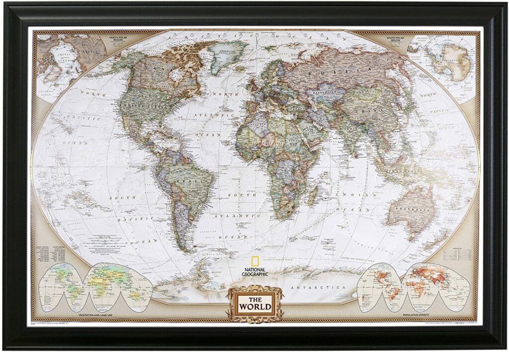 A framed world map wall art with a vintage design, featuring a detailed map of the continents and additional illustrations at the corners.