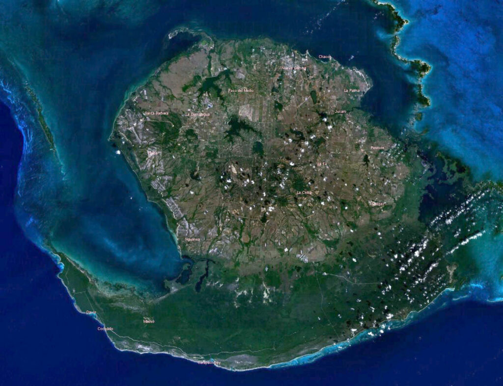 Aerial view of Isla de la Juventud, showing the island's terrain and surrounding waters.