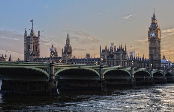 A view of the "Big Ben" clock tower at the Palace of Westminster in London at dusk.