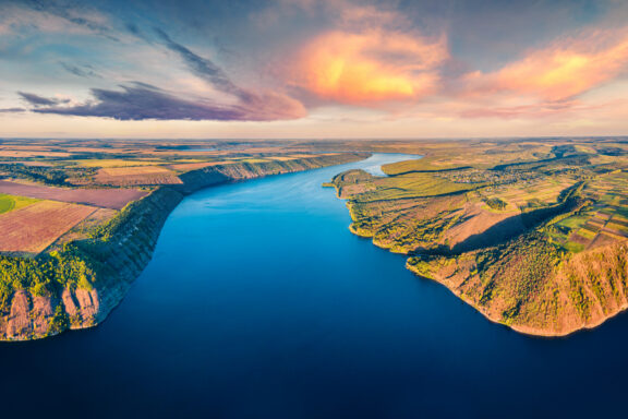 Awesome morning view from flying drone of Bakotska Bay. Fantastic summer sunrise on Dnister river, Ukraine, Europe. Beauty of nature concept background.