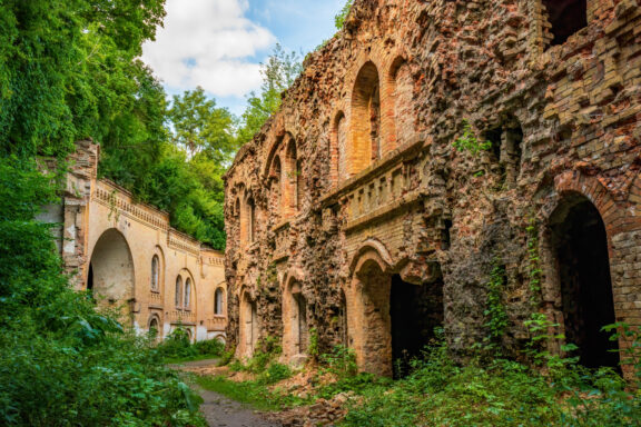 Ruins of an old fort with overgrown vegetation in the Rivne region.