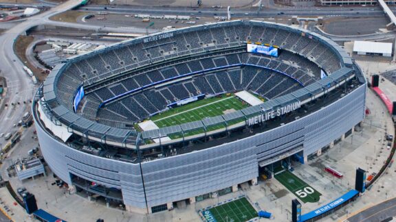 Aerial view of MetLife Stadium with empty seating and a visible field, located in New Jersey.