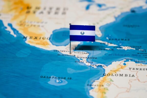 Flag pin of El Salvador marking its location in Central America