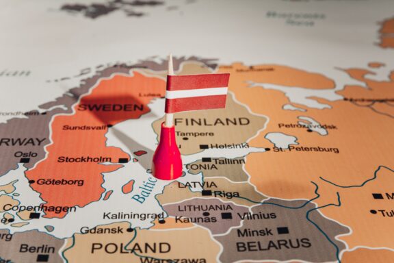 Flag pin of Latvia, pointing at the location of Latvia