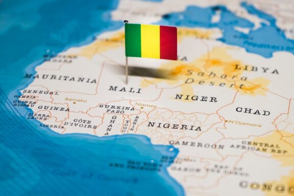 Mali's location in Western Africa, marked by a pin of its national flag