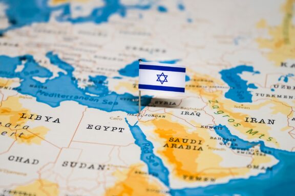 Israel flag-shaped pin underscores the country's place in global geopolitics