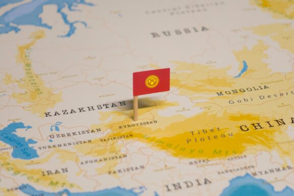 Kyrgyzstan's location in Central Asia, marked by a pin of its national flag