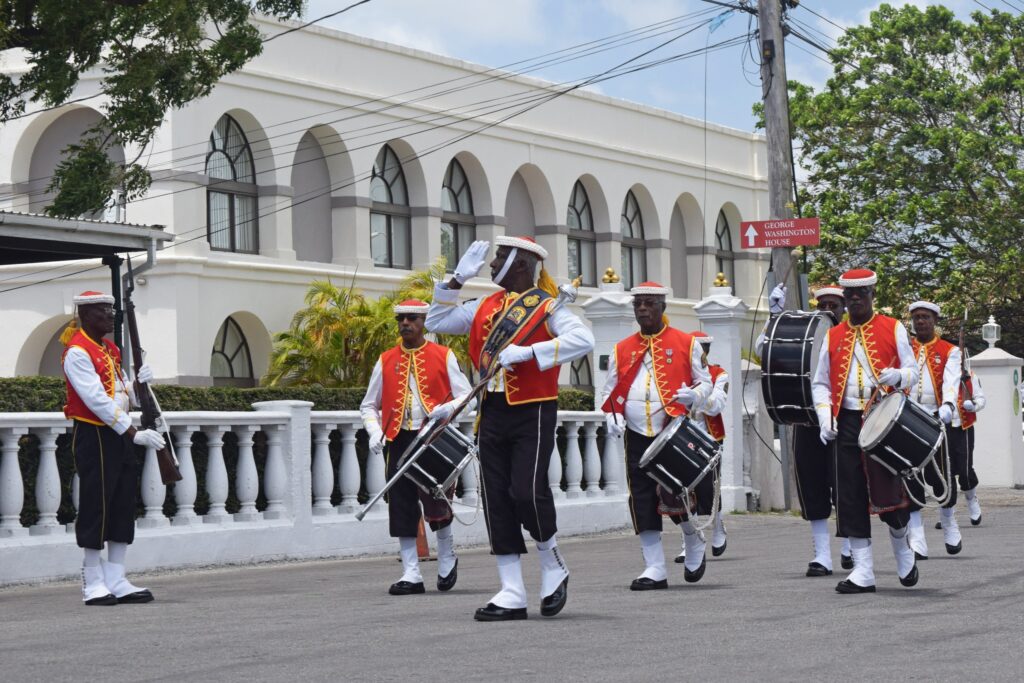 A group of uniformed ceremonial guards marching in Bridgetown, Saint Michael, Barbados.