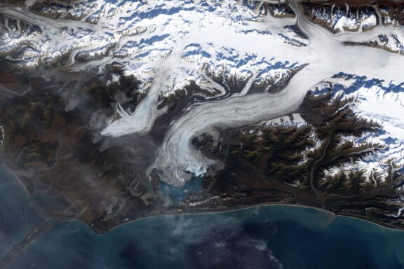 A top-down satellite image of the Bering Glacier in Alaska.