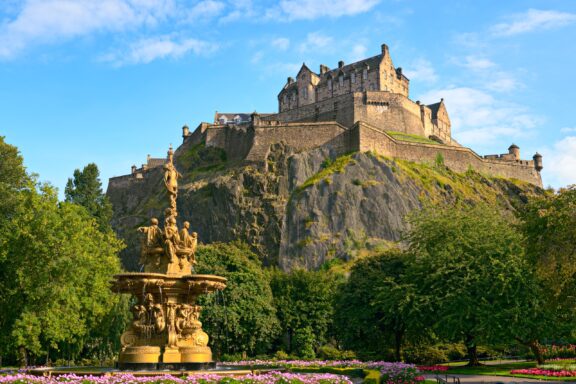 Edinburgh Castle, Scotland, from Princes Street Gardens, with the Ross Fountain in the foreground.