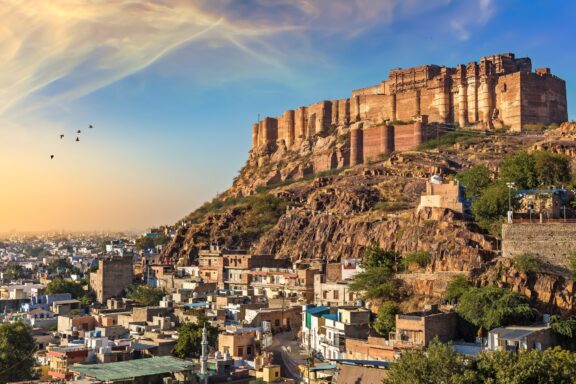 Mehrangarh Fort with Jodhpur city scape at sunset. A UNESCO World heritage site at Jodhpur, Rajasthan, India.