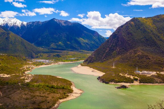 Nyingchi scenery in Qinghai - Tibet Plateau.  Brahmaputra River below the mountain Namjagbarwa. Taken on the Pai Town, Nyingchi, Tibet, China.