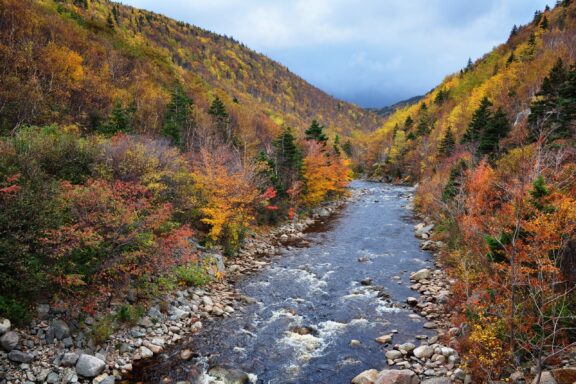 Storm clouds move in over the MacKenzie River in Cape Breton, Nova Scotia in the fall.