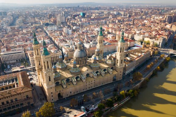 Aerial view of Roman Catholic Basilica Our Lady of Pillar on background of Zaragoza cityscape and Ebro river, Spain