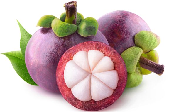 Mangosteen Fruit Halved and Whole Mangosteen fruit
