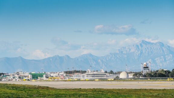 Milan's Linate Airport in the Lombardy region of northern Italy. The Italian Alps are clearly visible.