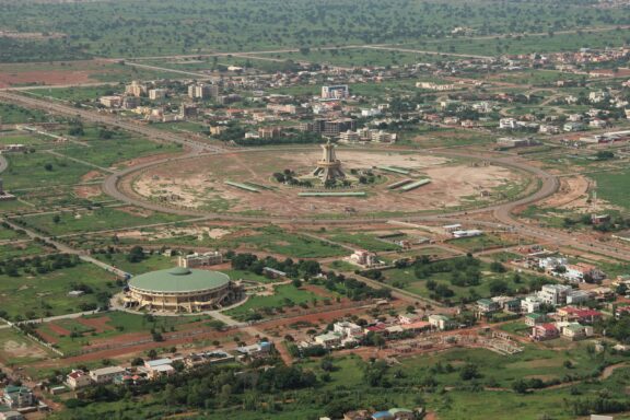 Aerial View of a National Heroes Monument and Surrounding Landscape Aerial view of Ouagadougou, Burkina Faso