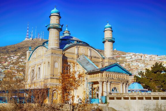 Mosque with Blue Domes Against Hillside Shah-Do Shamshira Mosque built during the reign of Amanullah Khan