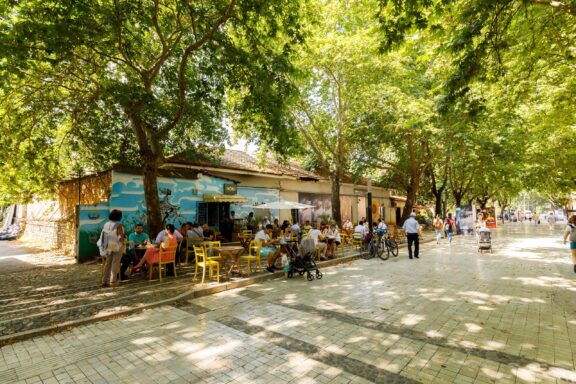 Tirana locals enjoying a stroll and outdoor cafe