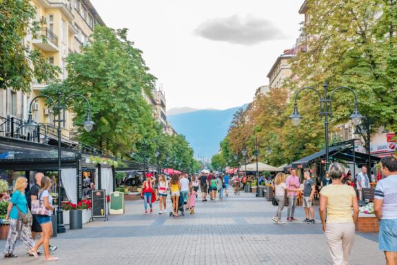 Bustling Street with Pedestrians and Shops People shopping on Vitosha Boulevard in Sofia
