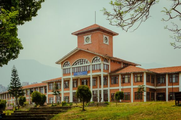 Stairs leading up to Tribhuvan University in Nepal.