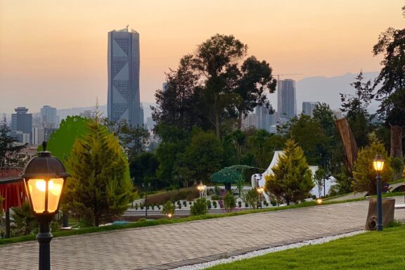Sunset View of City Park with Skyscrapers in the Background Unity Park in Addis Ababa