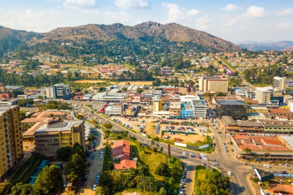 Aerial View of Downtown Mbabane, Eswatini, on a Sunny Day An aerial view of Mbabane, the capital city of Eswatini.