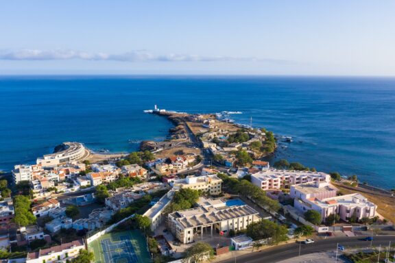 Aerial View of Coastal Town and Pier Aerial view of Praia