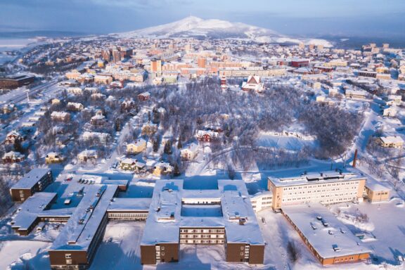 Aerial winter view of Kiruna, the northernmost town in Sweden, province of Lapland, winter sunny picture shot from drone.