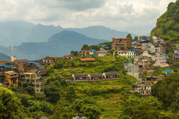 Bandipur, Nepal - Cityscape and mountains.