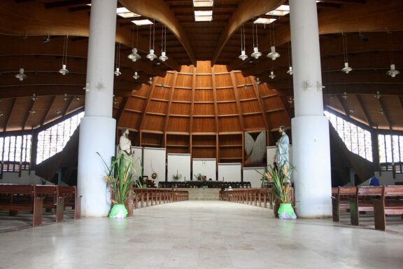 Interior View of Basilica with Wooden Vaulted Ceiling Basilica of Mary Queen of Apostles in Yaounde