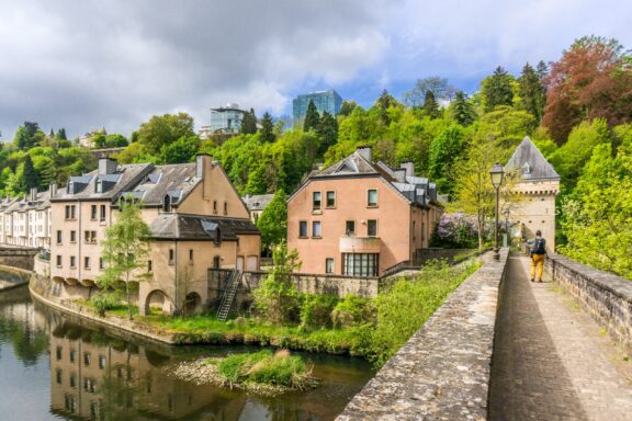 Scenic View of Pfaffenthal District with Traditional Buildings in Luxembourg City Beautiful buildings line a canal in the Pfaffenthal quarter of Luxembourg City.