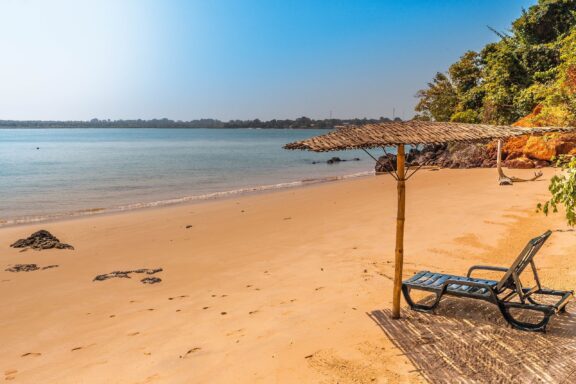 Serene Beach View with Bench on Bijagos Island The Bijagós Islands, an archipelago off the coast Bissau