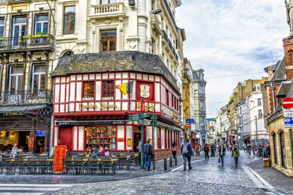 Vibrant Street Scene in Brussels with Historic Architecture and Pedestrians Brussels april 21 2016 typical street