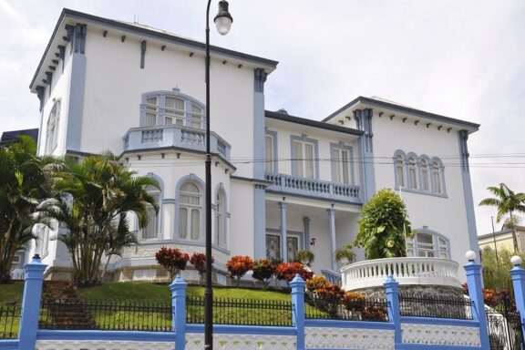 Blue Castle-like Building with Fence Castillo Azul (Blue Castle) in San Jose