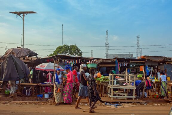 Conakry locals' daily life along the lively streets where merchants peddle their wares