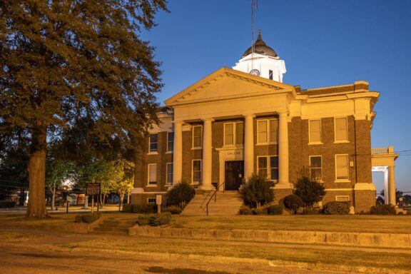 The Historic Dallas County Courthouse at dusk in Fordyce, Arkansas.