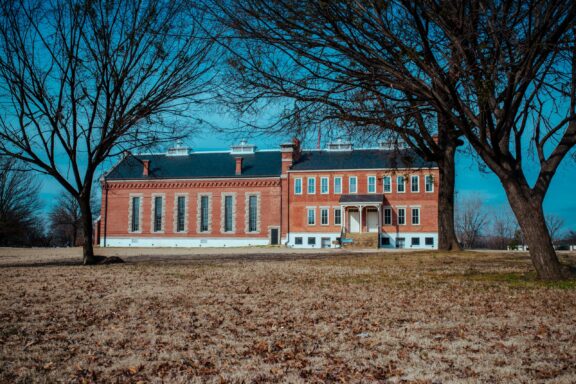 The Fort Smith National Historic Site can be seen between the trees in Sebastian County, Arkansas.