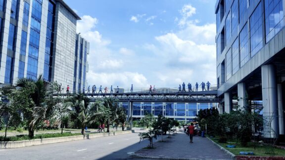 People walk across a sky bridge in Gazipur, Bangladesh.