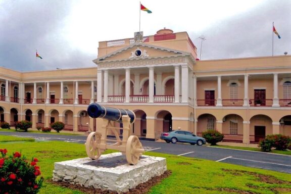 Georgetown Parliament Building with Cannons in Foreground Parliament Building in Georgetown