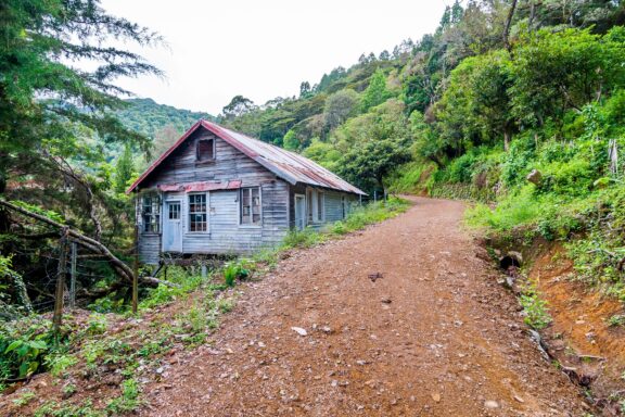 Rustic Cabin Along a Dirt Road in La Tigra National Park An old mine building in La Tigra National Park
